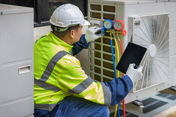 Professional Hvac technician working in Bethesda, MD